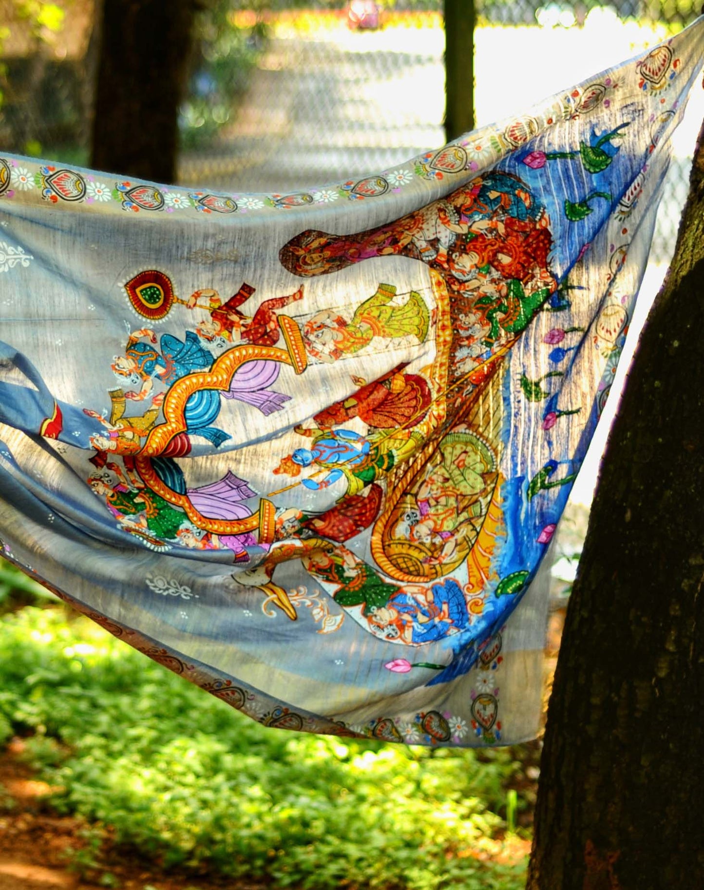 "Boitha Bandhana" - Steel Blue Pattachitra Handpainted Saree