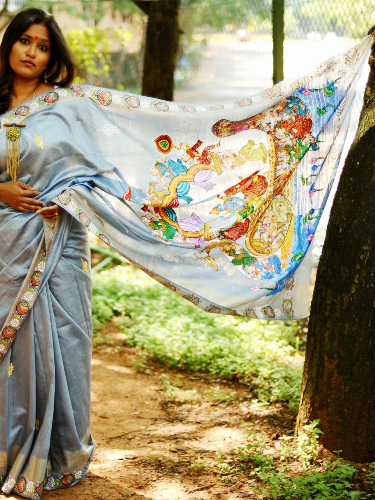 "Boitha Bandhana" - Steel Blue Pattachitra Handpainted Saree