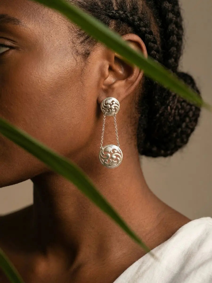 Statement 92.5 Silver drop earrings with chain accents on model